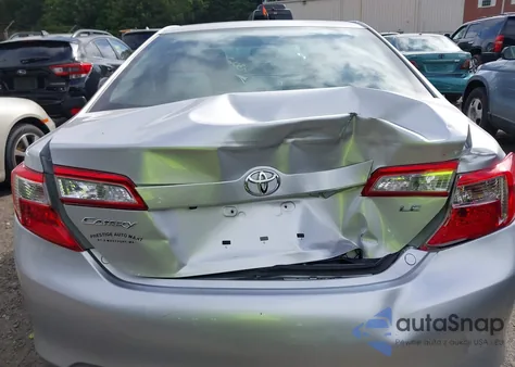 2014 Toyota Camry Le z USA, uszkodzony, nr VIN 4T4BF1FK7ER382583